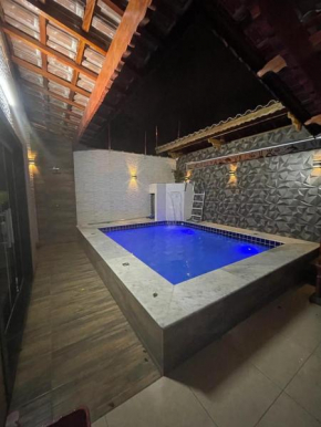 Casa com piscina em praia grande piscina aquecida